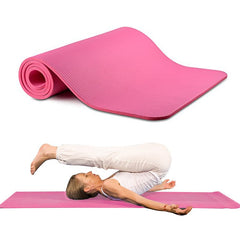 Woman practicing yoga on Swan & Field Inner Swan 6mm NBR yoga mat.
